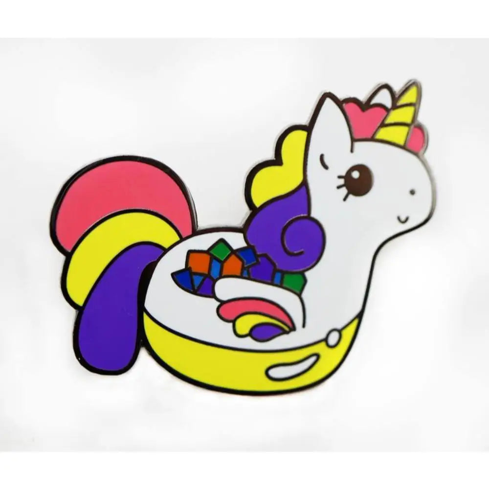 A colorful enamel pin of sparkles the adorable dice unicorn with a rainbow mane sitting in a bowl of multicolored cubes