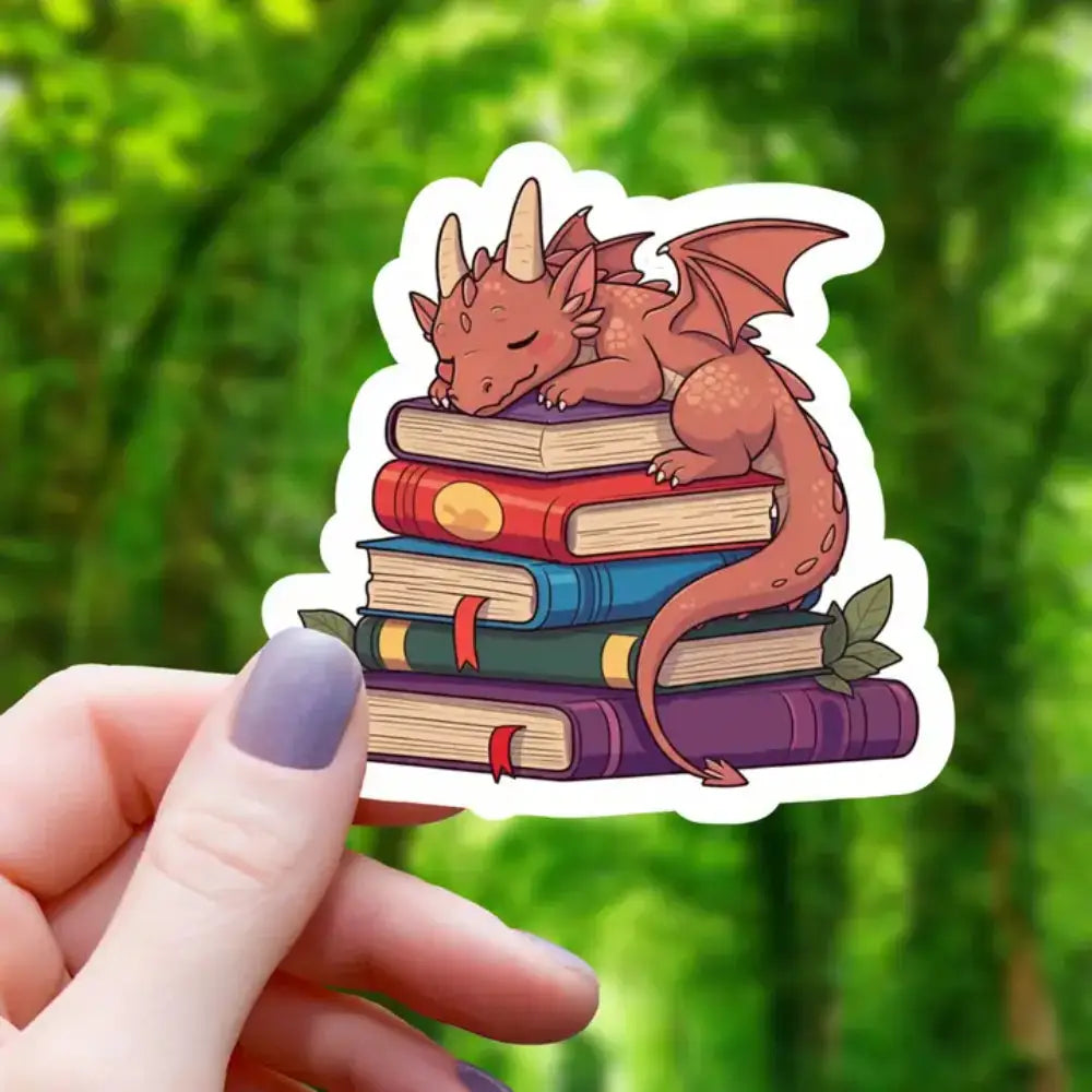 Dragon Sleeping on Books Sticker - Gifts
