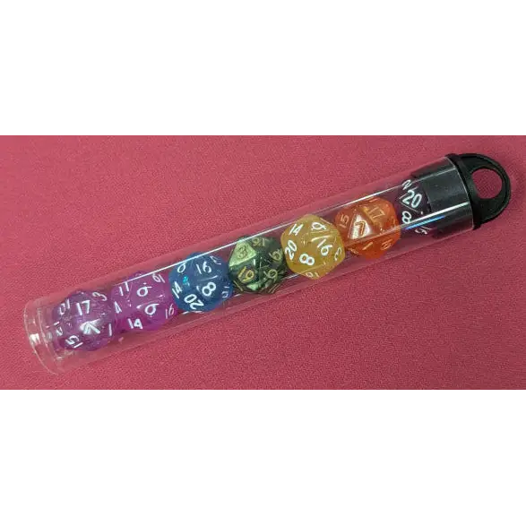 Set of colorful polyhedral dice in a clear tube on a red background