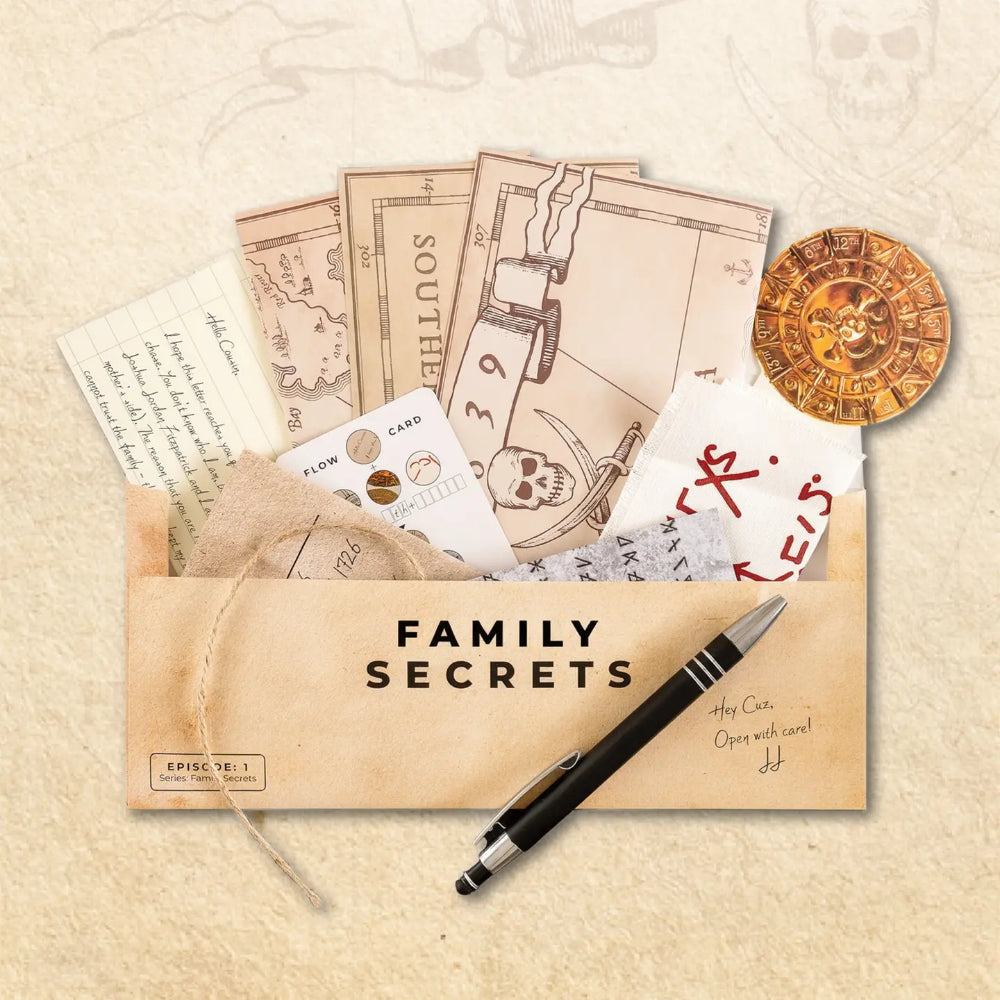 A black and silver ballpoint pen with a sleek modern design next to an envelope labeled family secrets for the Family Secrets Escape Game