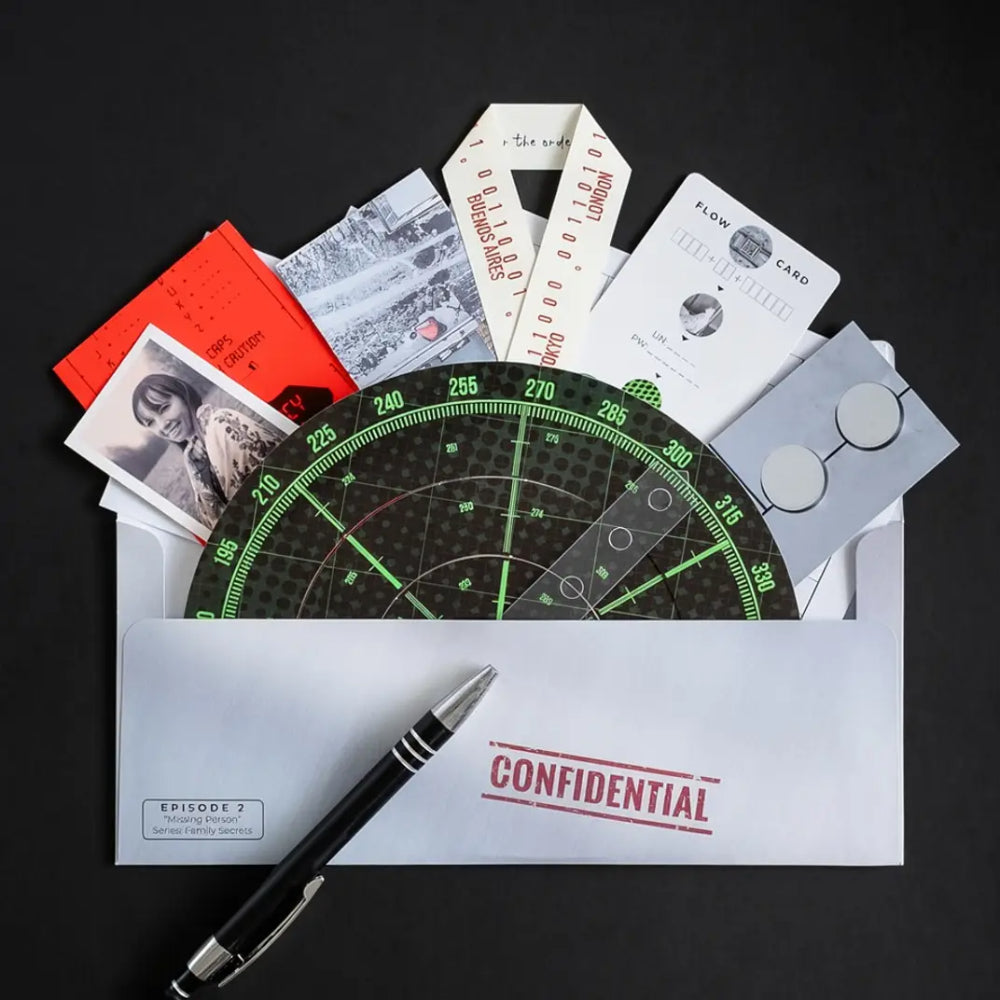 A sleek black pen with silver accents rests beside a white confidential envelope in the Family Secrets Escape Game set