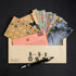 Beige envelope with black geometric math equations and colorful papers labeled season 1 episode 3 for Family Secrets Escape Game
