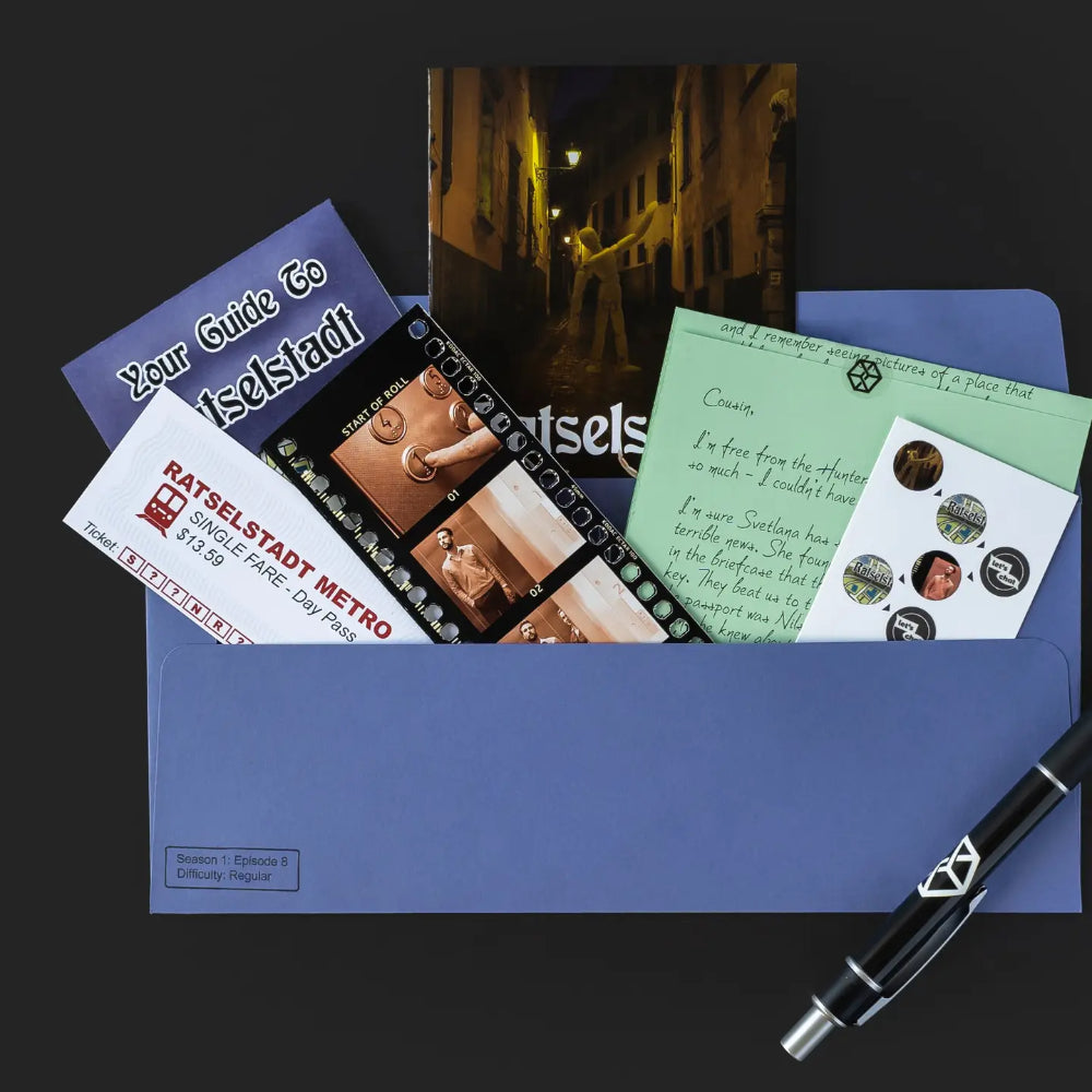 Blue envelope containing travel items and a pen for the family secrets escape game board game set