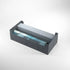 Black rectangular gamegenic dungeon 1100+ convertible deckbox holding gray cards and a rolled translucent blue document