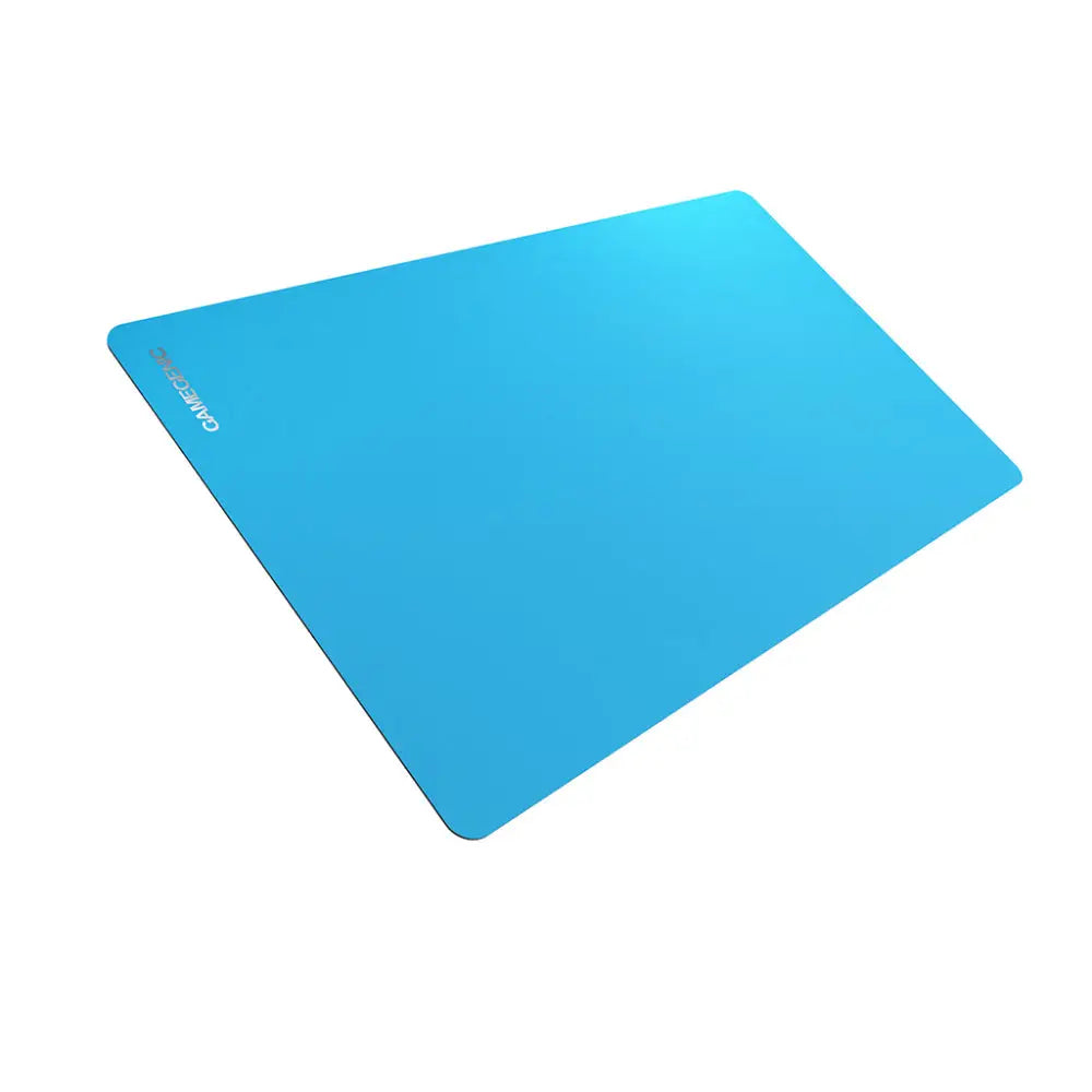 Bright blue rectangular Gamegenic prime playmat mousepad with smooth matte finish and camer branding in the corner