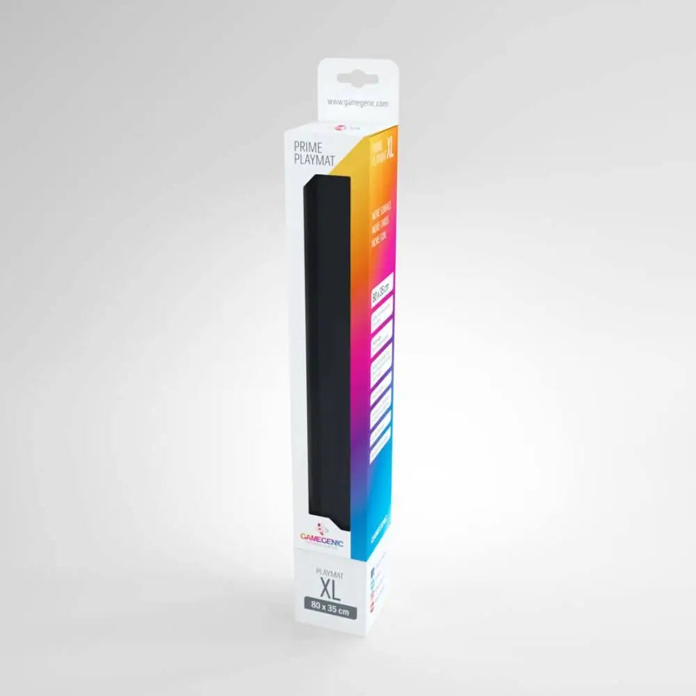 Black Gamegenic Prime Playmat XL in retail packaging with vibrant rainbow gradient and Gamegenic branding at the bottom
