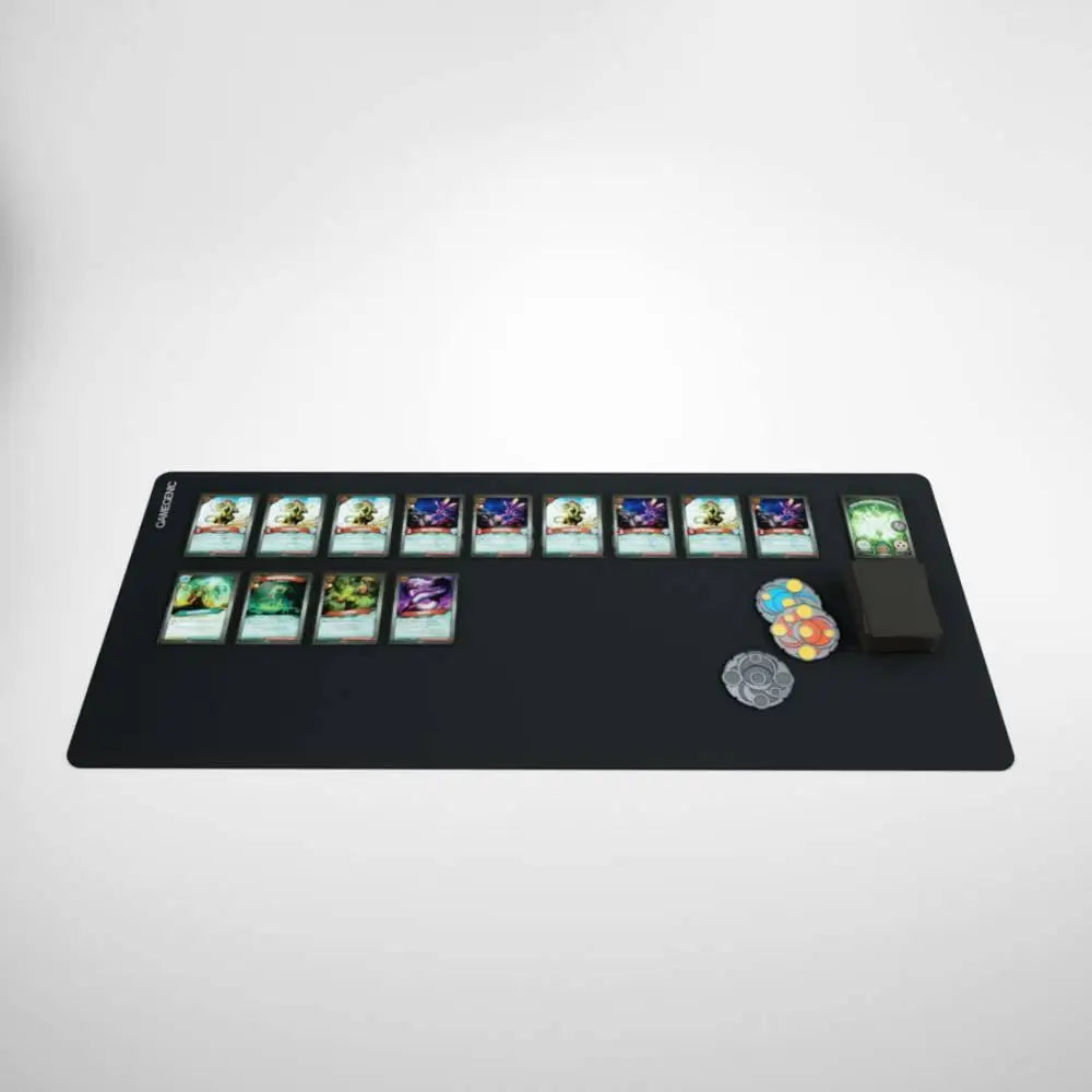 Black rectangular Gamegenic Prime Playmat XL gaming mat with printed card game layout and assorted colorful tokens