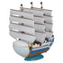 A detailed one piece model kit of the grand ship collection moby dick with white sails and blue brown hull details