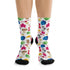 White socks featuring a playful pattern of colorful dice and pawns from the pixel games collection