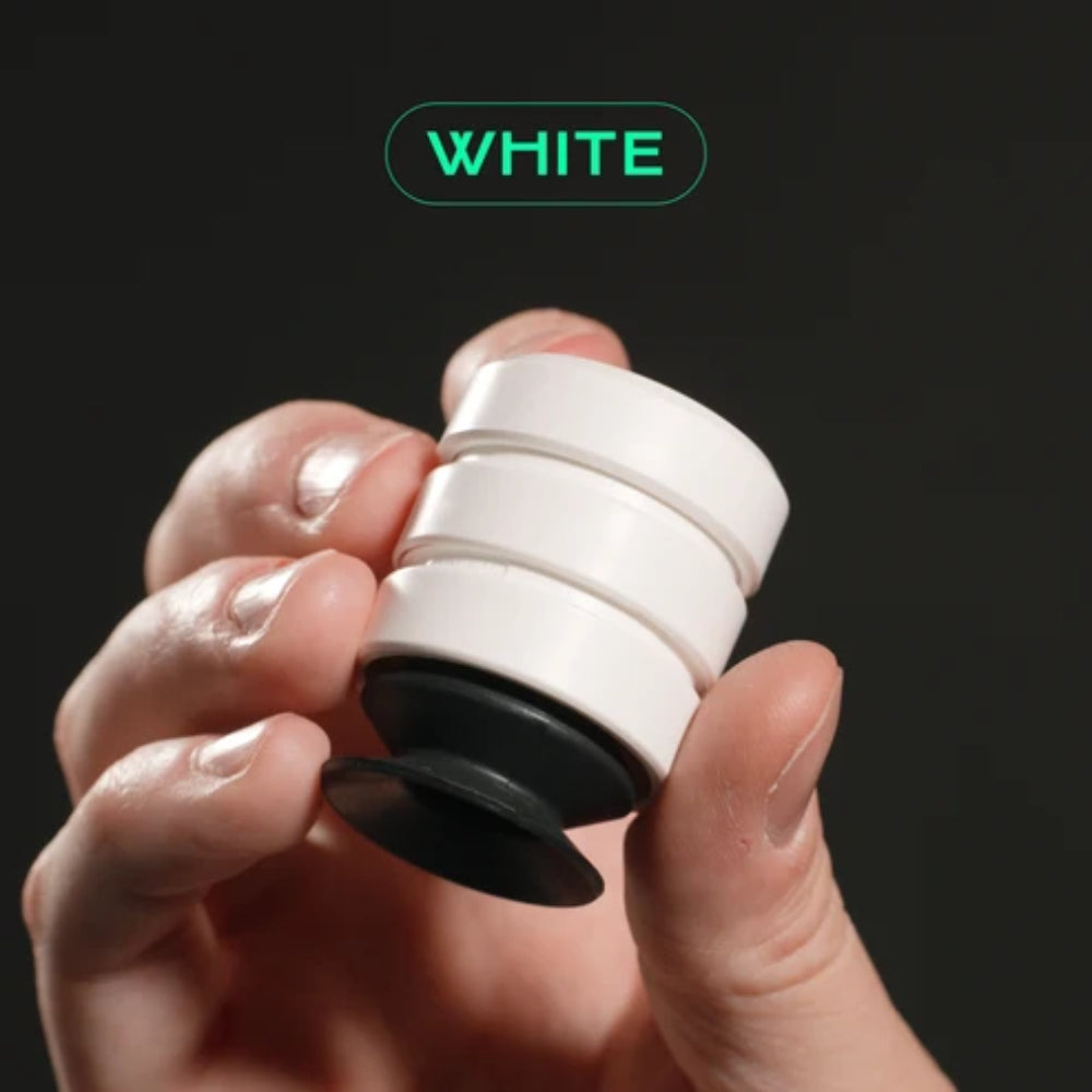 White P’KUP card lifter fidget spinner with three stacked circular sections and a black base for smooth handling