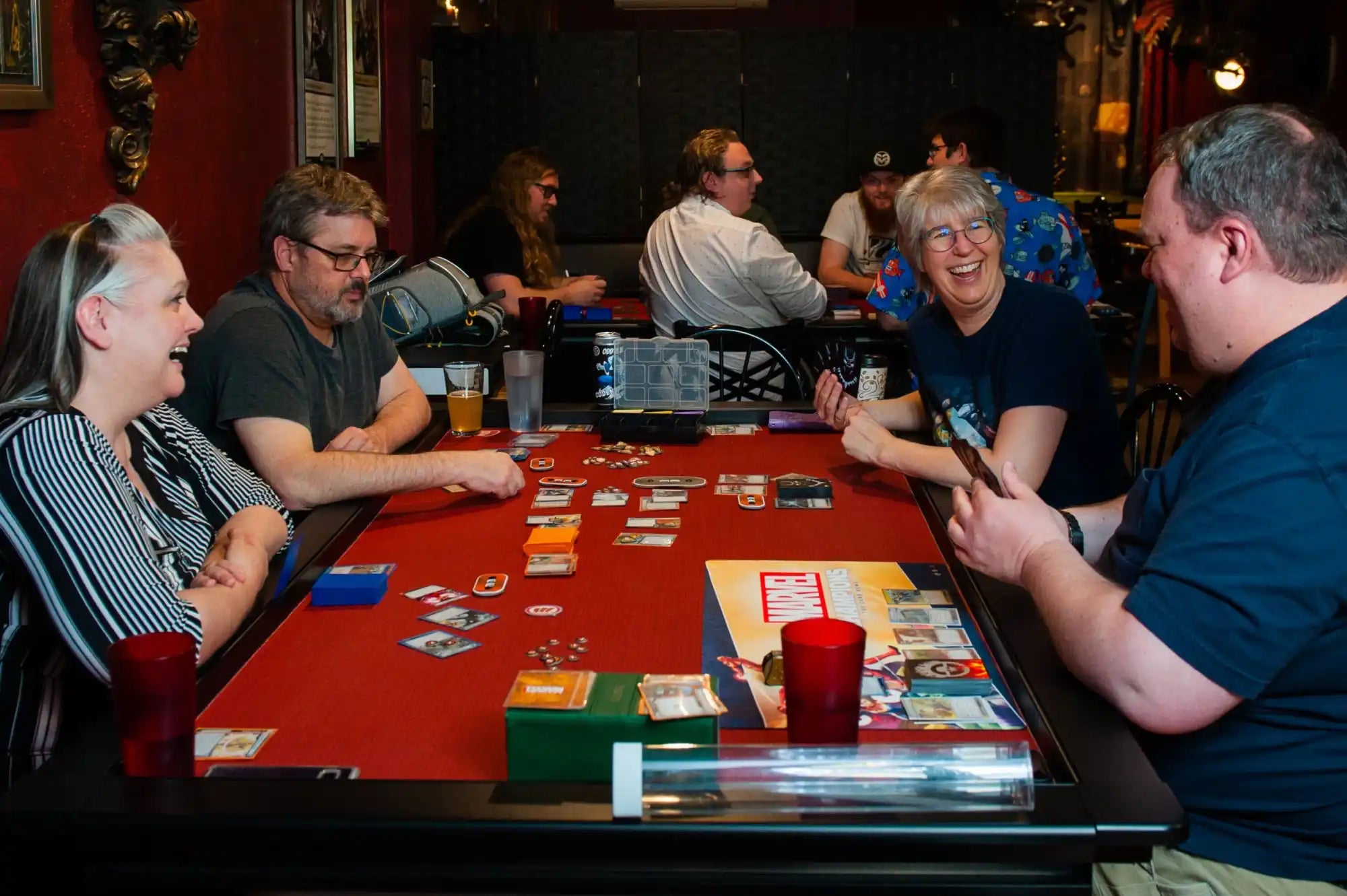 people playing board games