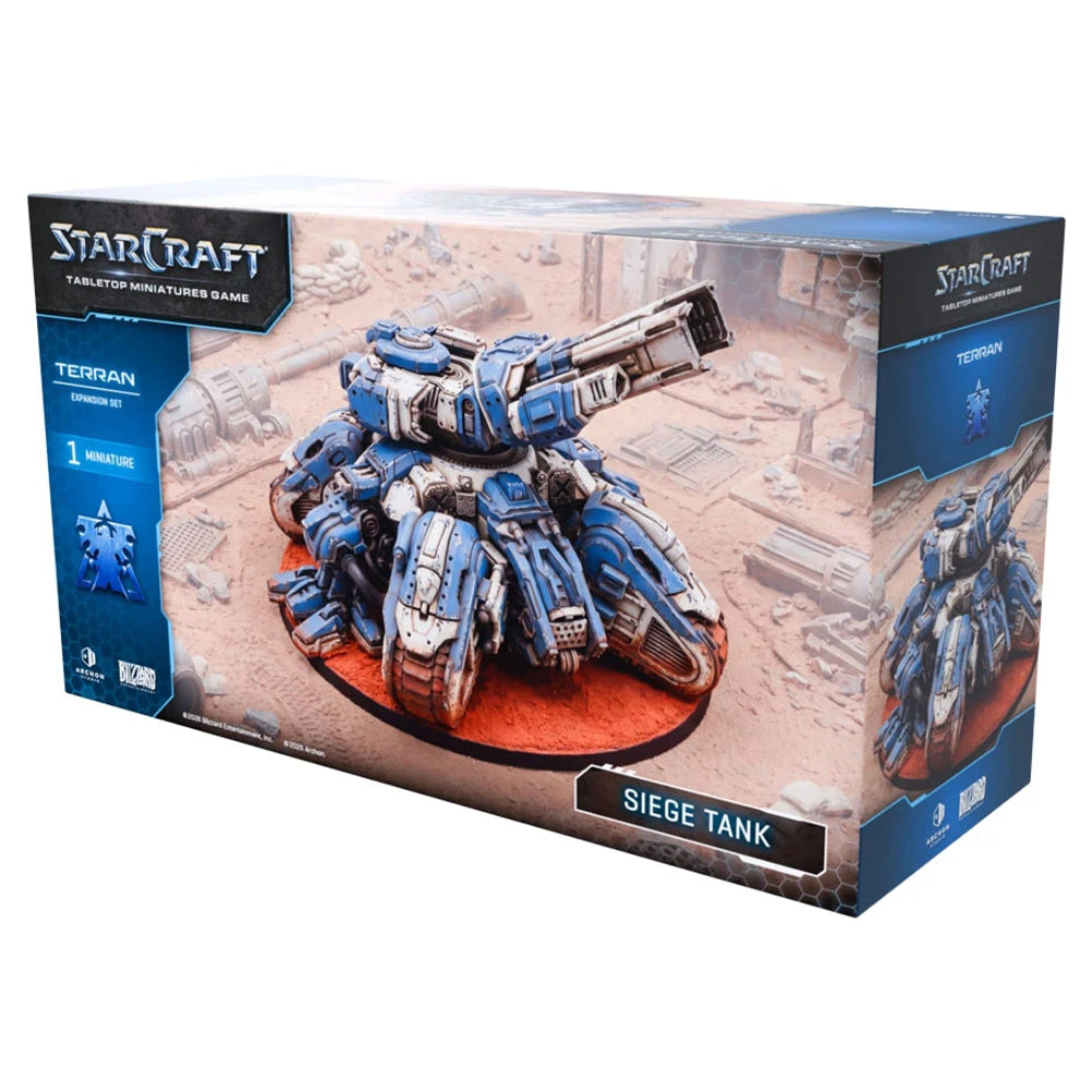 Blue and white painted StarCraft Terran Siege Tank miniature with detailed armor plating and mounted heavy cannon