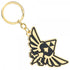 The legend of Zelda metal keychain in gold enamel features a stylized bird with outstretched wings and triforce symbol