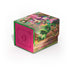 Vibrant pink and green Ultimate Guard Sidewinder 100 Xenoskin deckbox featuring fantasy characters among flowers