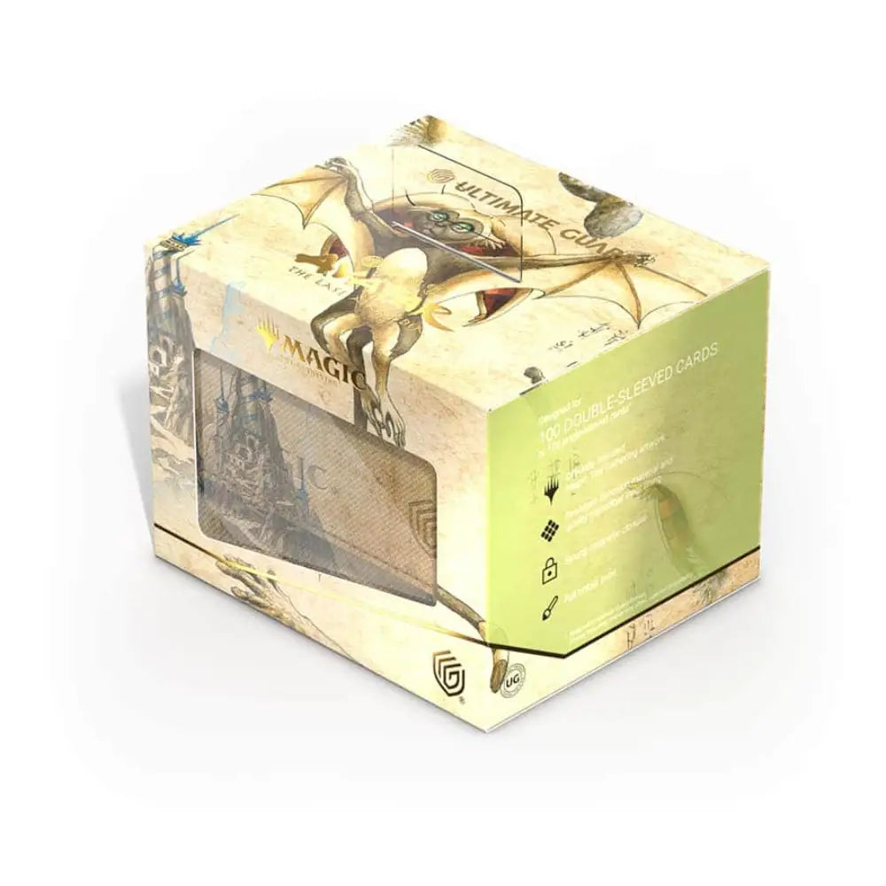 A beige and green cardboard Magic the Gathering Ultimate Guard double-sleeved deckbox featuring dragon artwork and logo