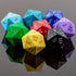 A vivid heavy metal d20 polyhedral die in assorted colors with embossed numbers on a glossy plastic surface