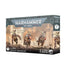 Warhammer 40000 t’au empire krootox rampagers miniature set with three citadel-painted armored beast warriors on rocky terrain