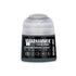 A small cylindrical bottle of Warhammer Tone Pro paint in Craventhrone Cloak with a translucent cap and black label