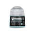 A small translucent plastic bottle of Warhammer Tone Pro paint in Craventhrone Cloak shade 12ml