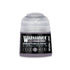 A small translucent plastic bottle of Warhammer Tone Pro paint in the color Enrapture Dusk 12ml
