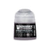 A small cylindrical bottle of Warhammer Tone Pro paint in the shade Enrapture Dusk 12ml for miniature painting
