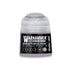 A small translucent plastic bottle of Warhammer Tone Pro paint in the shade Enrapturess Dusk 12ml