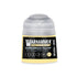 A small cylindrical bottle of Warhammer Tone Pro paint in hawkshroud yellow for miniature painting 12ml