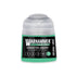 A small translucent plastic bottle of Warhammer Tone Pro Hierotek Green paint with a black label and teal accents