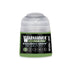 A small translucent plastic bottle of warhammer tone pro kruleboyz green paint with clear cap and green label