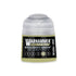 A small translucent plastic bottle of Warhammer Tone Pro paint in Kruleboyz green 12ml