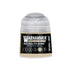 A small translucent plastic bottle of Warhammer Tone Pro Necrolith Bone paint with a clear cap and black label