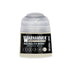 A small cylindrical bottle of Warhammer Tone Pro paint in the color Necrolith Bone 12ml for miniature painting