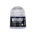 A small translucent plastic bottle of Warhammer Tone Pro paint in the shade Shalaxi Violet 12ml