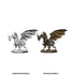 Wizkids unpainted clockwork dragon miniature figurines showing one in metallic silver and one painted with bronze armor