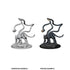 Unpainted and painted black multi-tailed displacer beast monster miniatures on circular bases by WizKids