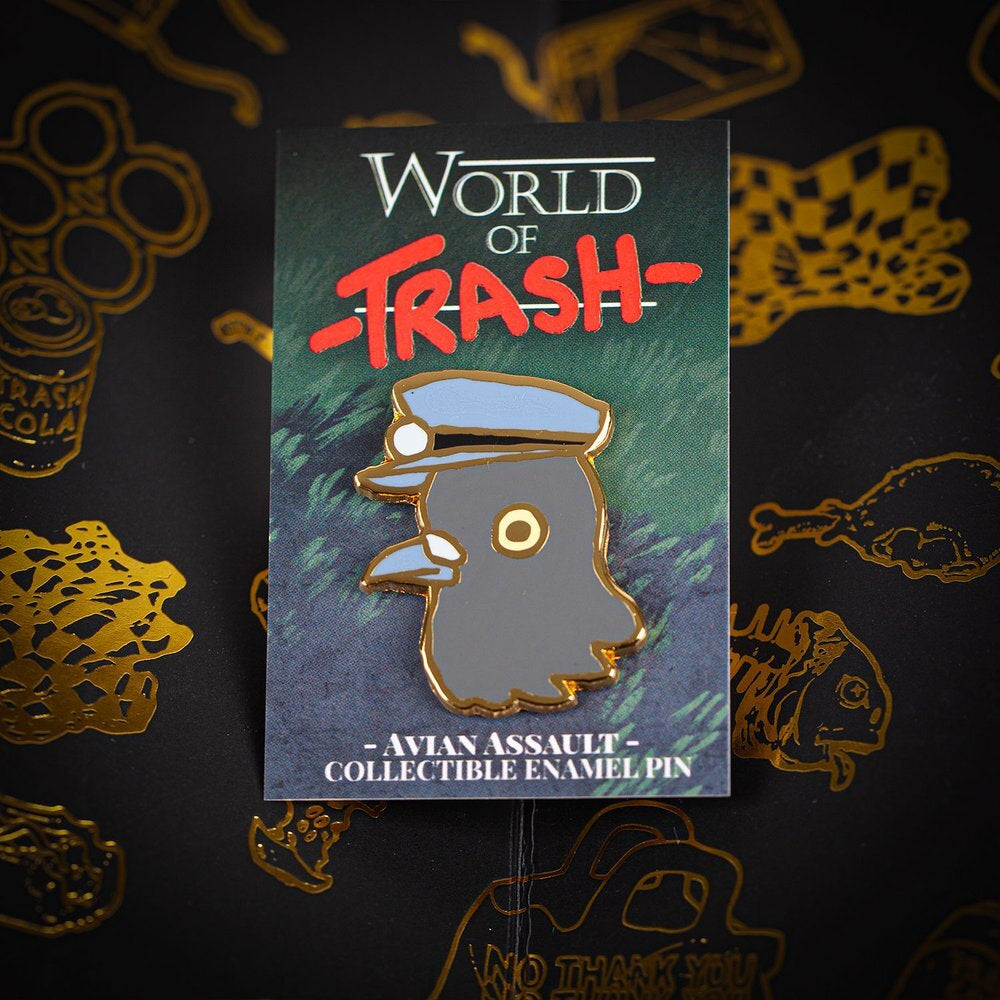 Gray hard enamel pin with gold trim depicting a bird in a police-style hat from world of trash avian assault series