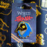 Blue and gold hard enamel pin featuring a stylized bird in a hooded cloak with yellow eyes labeled corvid chaos