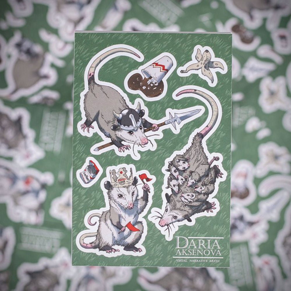 Green sticker sheet featuring illustrated opossum characters in whimsical poses from world of trash mama knows best